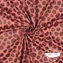 Tela impermeable Raincoat Animal Print fondo rosa