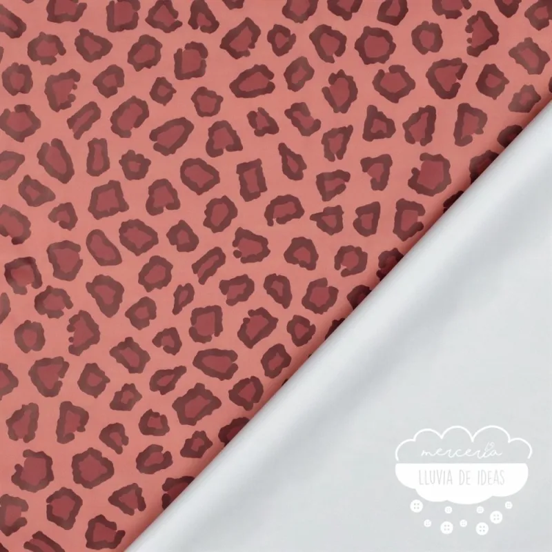 Tela impermeable Raincoat Animal Print fondo rosa